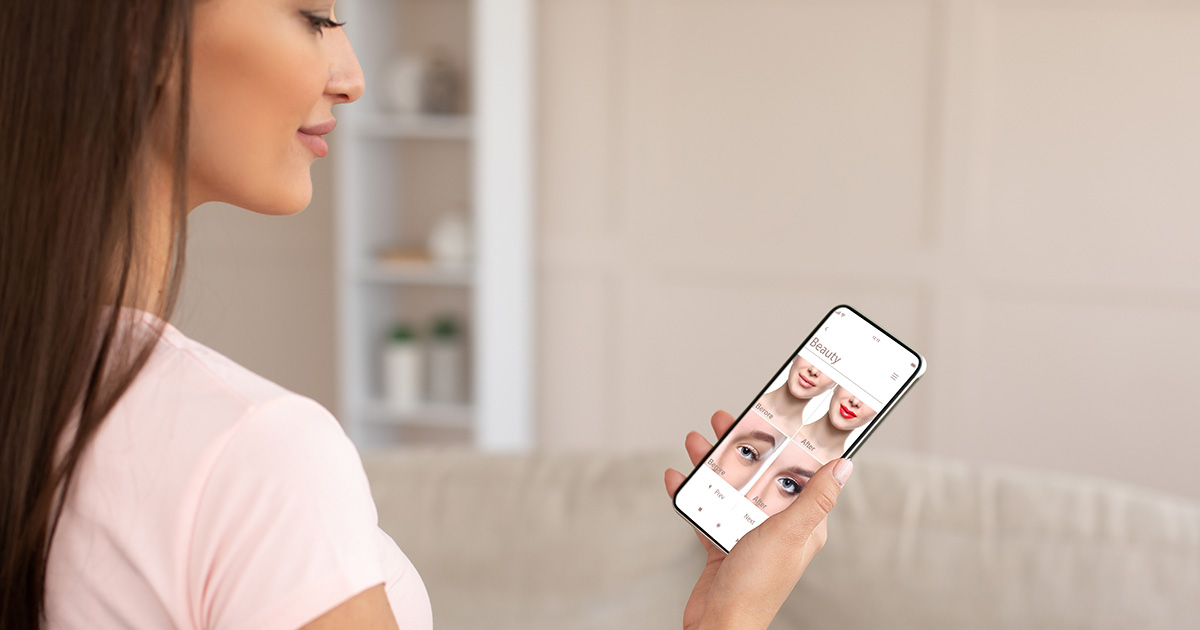 Augmented Reality Beauty App. Woman Trying Different Makeup Online