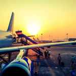 photography of airplane during sunrise