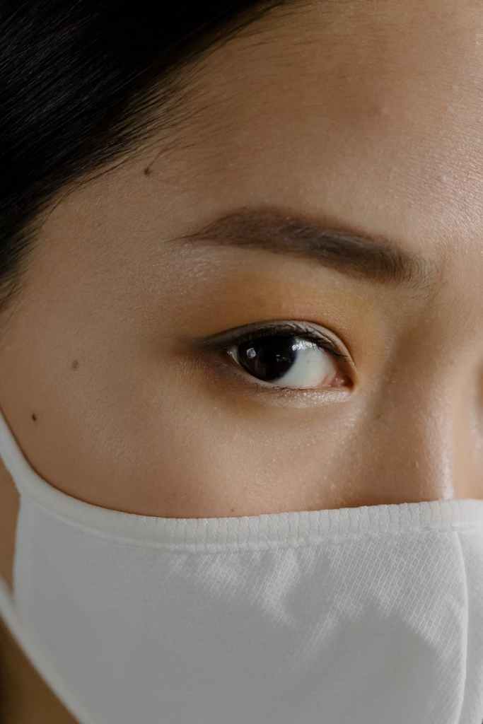 closeup crop woman in mask