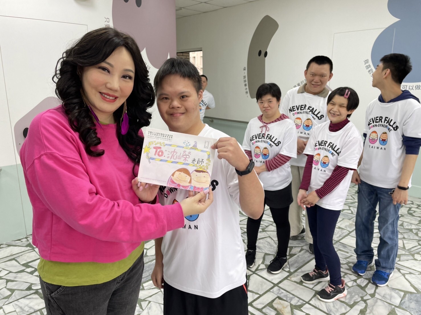 ▲沈嶸老師一月一公益。(圖/唐氏症基金會提供)