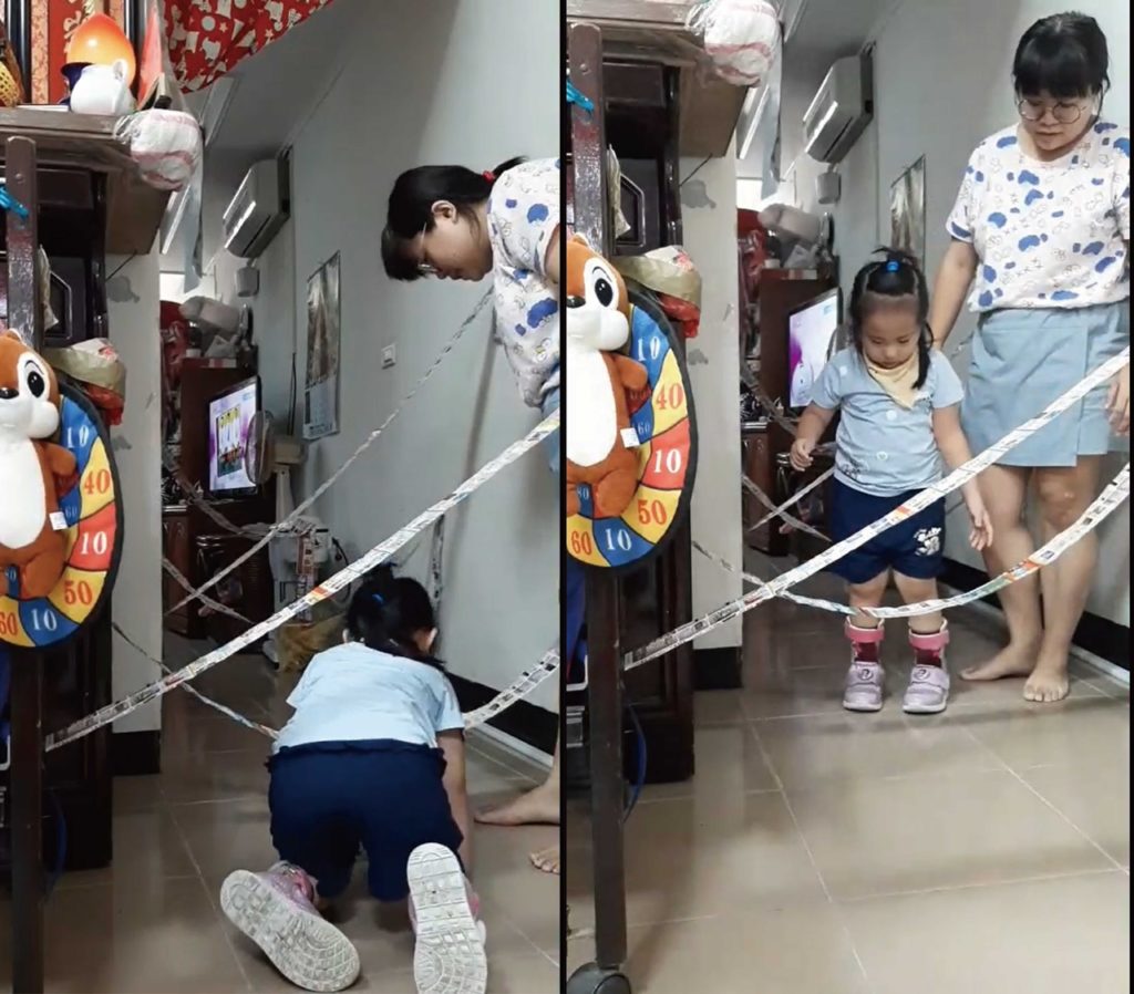家長根據老師提供的教學影片，把家打造成小關卡，訓練認知、手腳運動能力。(伊甸基金會提供)_工作區域 1