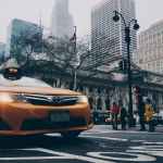 yellow toyota sedan on in highway road