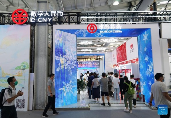 Visitors line up to experience e-CNY (digital yuan) payment at an exhibition of financial services during the 2022 China International Fair for Trade in Services (CIFTIS) at the Shougang Park in Beijing, capital of China, Sept. 4, 2022. (Xinhua/Jin Haoyuan) Visitors line up to experience e-CNY (digital yuan) payment at an exhibition of financial services during the 2022 China International Fair for Trade in Services (CIFTIS) at the Shougang Park in Beijing, capital of China, Sept. 4, 2022. (Xinhua/Jin Haoyuan)