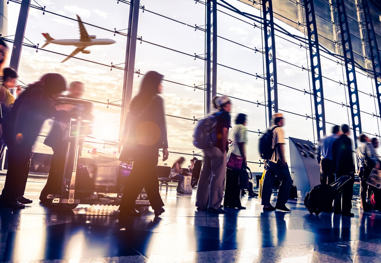 Passengers,In,An,Airport