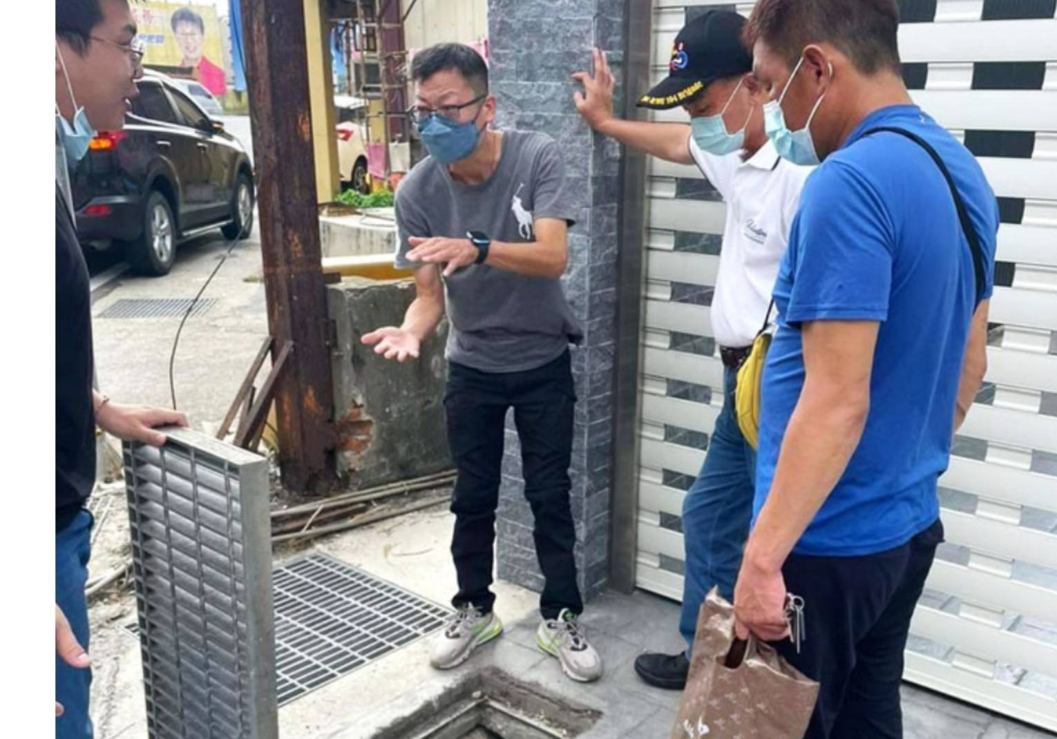 圖片說明：楊維智（左2）積極參與社區事務熱心協助里民各項事務。 (圖/記者林㤈輝翻攝)