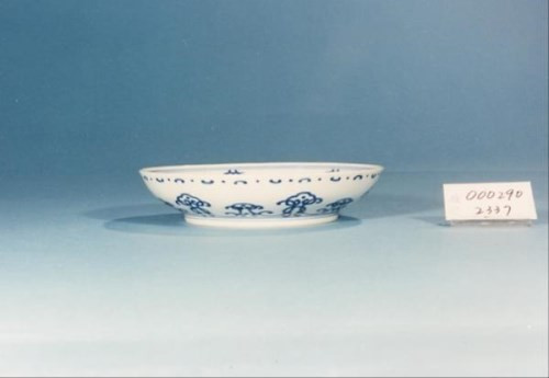 明朝弘治款嬌黃綠彩雙龍小碗(圖/國立故宮博物院)
