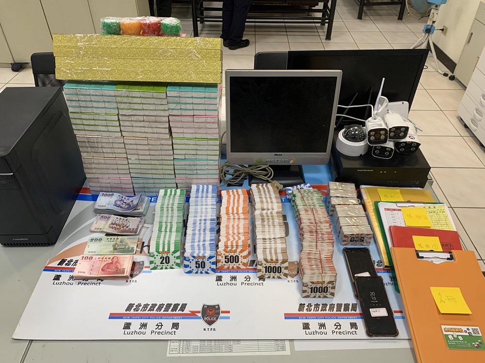 棋牌社藏麻將賭場 警連破兩地涉點數卡換現金逮41人 254 棋牌社藏麻將賭場 警連破兩地涉點數卡換現金逮41人 253