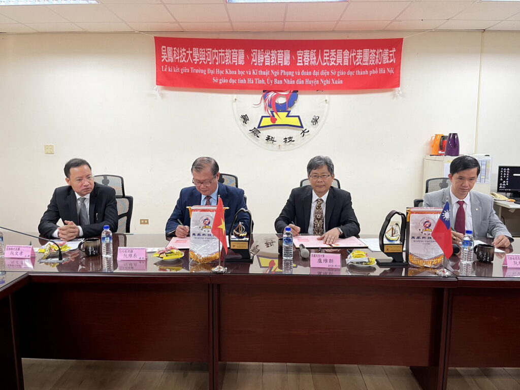 圖文說明:越南代表團參訪吳鳳科大締結盟約促進學術交流,吳鳳科大代表簽約盧維新副校長