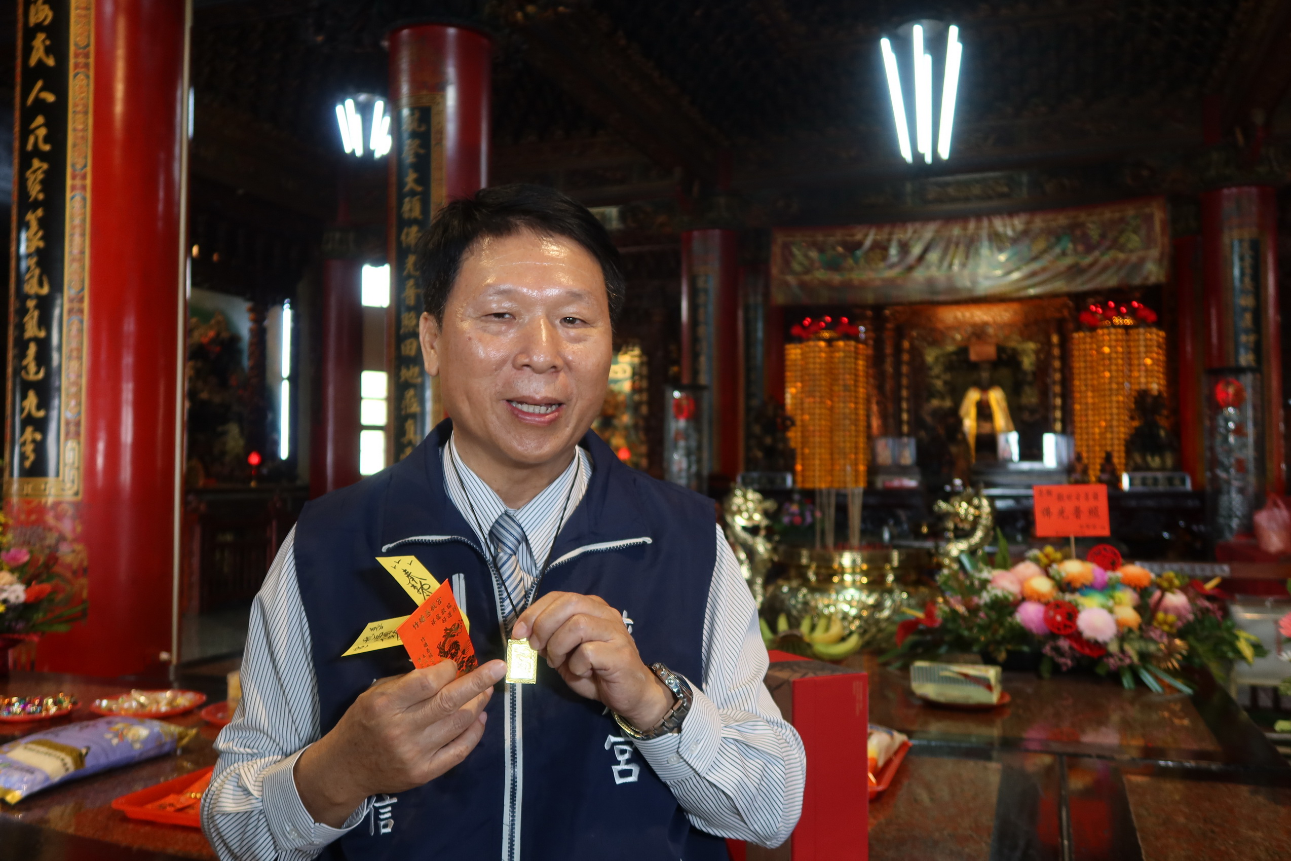 ▲竹塘慈航宮宣布今年春節將送出1萬組特製「金龍騰飛福（符）袋」，為信眾帶來滿滿祝福。（記者張溎壕攝）