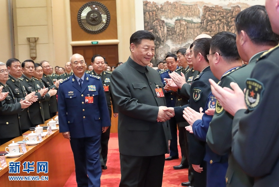 中共中央總書記、國家主席、中央軍委主席習近平出席十三屆全國人大二次會議解放軍和武警部隊代表團全體會議,會前接見與會代表。圖/取自新華社