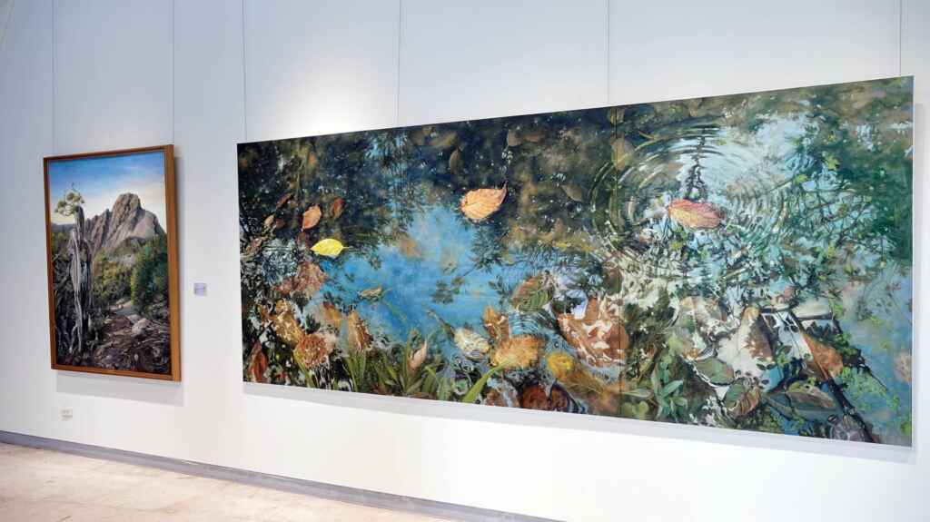 ▲游進賢油畫作品展,展現遊歷各地的美麗與感動,這份熱愛土地、關懷鄉土的精神,讓人深刻愛上斯土斯情。(記者林明佑攝)