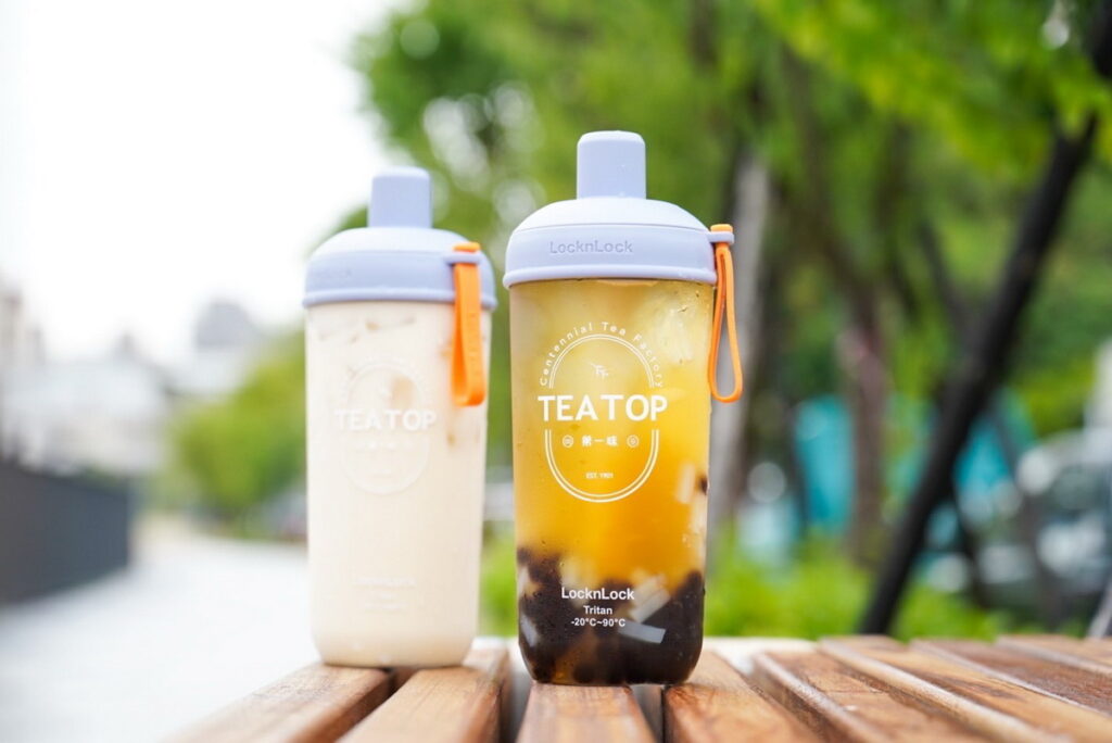 「TEA TOP第一味」目前全台共有170家門市，擴展大多集中於中部地區，已被譽為「手搖飲中霸天