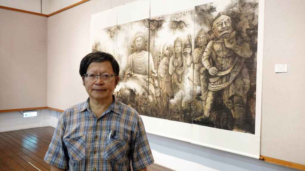 ▲中華現代國畫研究學會理事長陳銘顯大作《龍門石窟》。(記者林明佑攝)