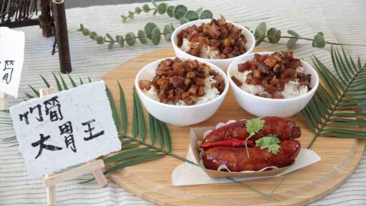 ▲趣味大胃王競賽讓參賽者竹筍香腸及竹筍肉燥飯吃到飽，還有多元的創意竹筍料理展示等。（記者林明佑攝）