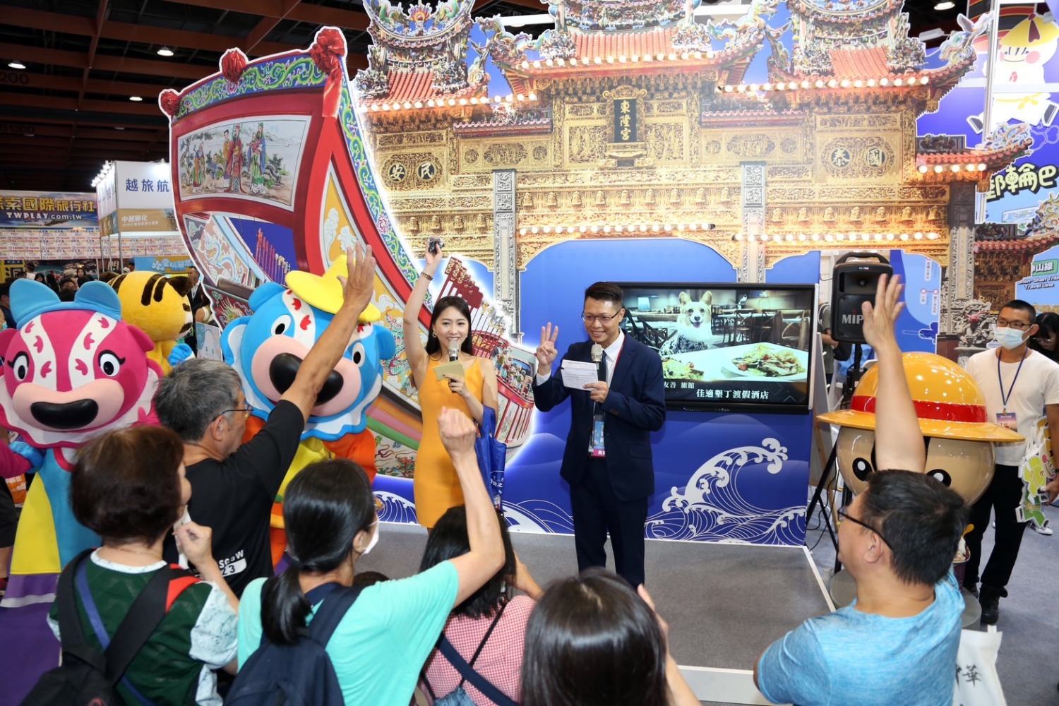 「屏東迎王平安祭典」讓參加台北國際夏季旅展民眾 感受到滿溢的平安福氣