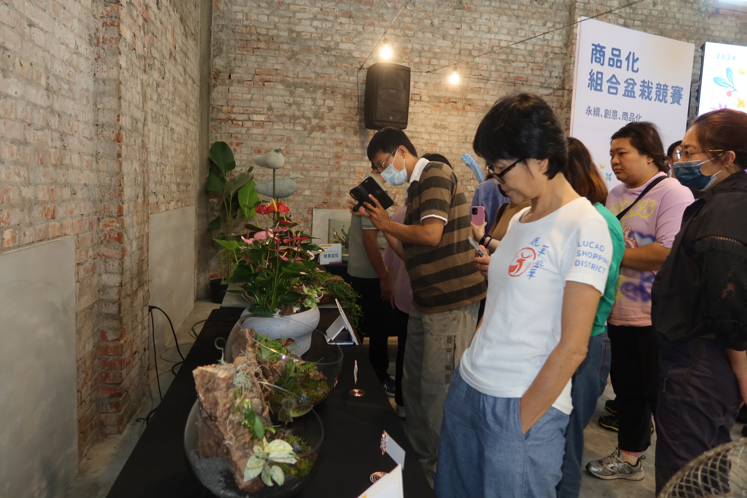 ▲田尾公路花園協會將於9月28-29日舉辦第四屆商品化組合盆栽競賽，參賽者前訓課程讓選手預先準備。（記者張溎壕攝）
