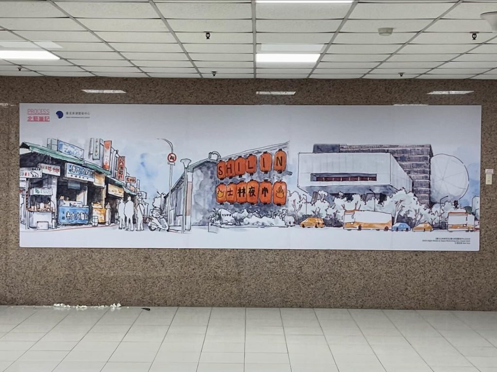 郭正宏描繪士林夜市與北藝的看板作品,展示於義信里里辦公室。