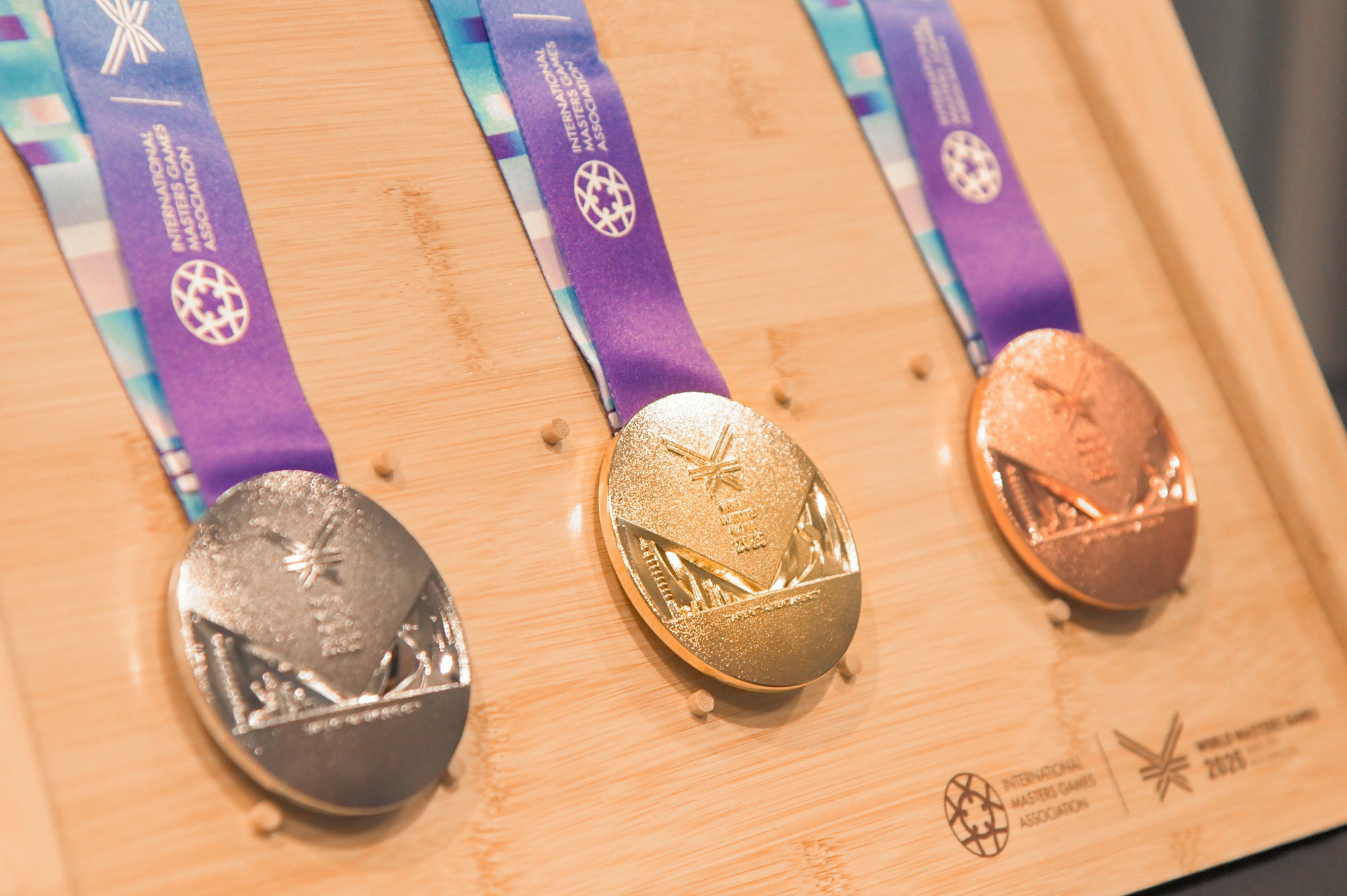 2025雙北世壯運獎牌設計融合2大城市意象，野柳女王頭與臺北101