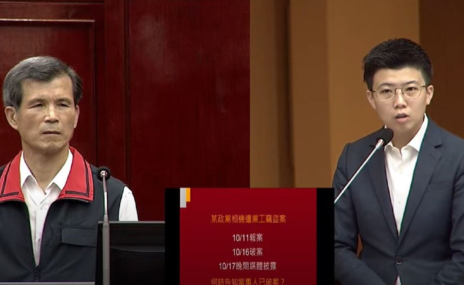 北市議員苗博雅(右)在21日就民眾黨竊案破案時間序,詢問台北市警察局長李西河(左)。翻攝北市議會直播畫面