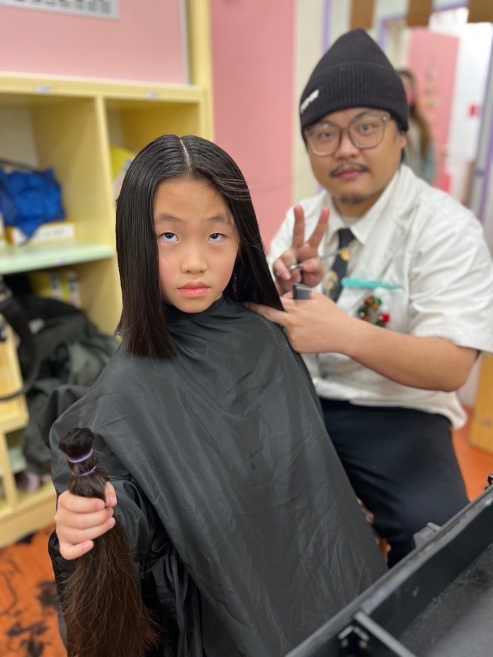 新生醫專攜手幼兒園 寒冬暖心捐髮助癌友 68 15665 4