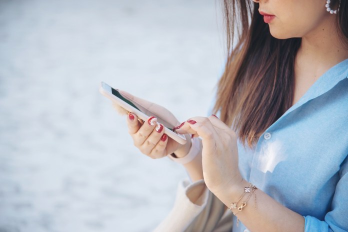 woman using mobile phone