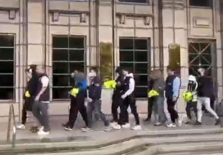 刑事局警方逮弘仁會詐團共12嫌。(記者徐煜勝翻攝)