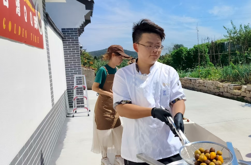 ▲這香噴噴的臺灣QQ地瓜球是陳飛番創業的起步。