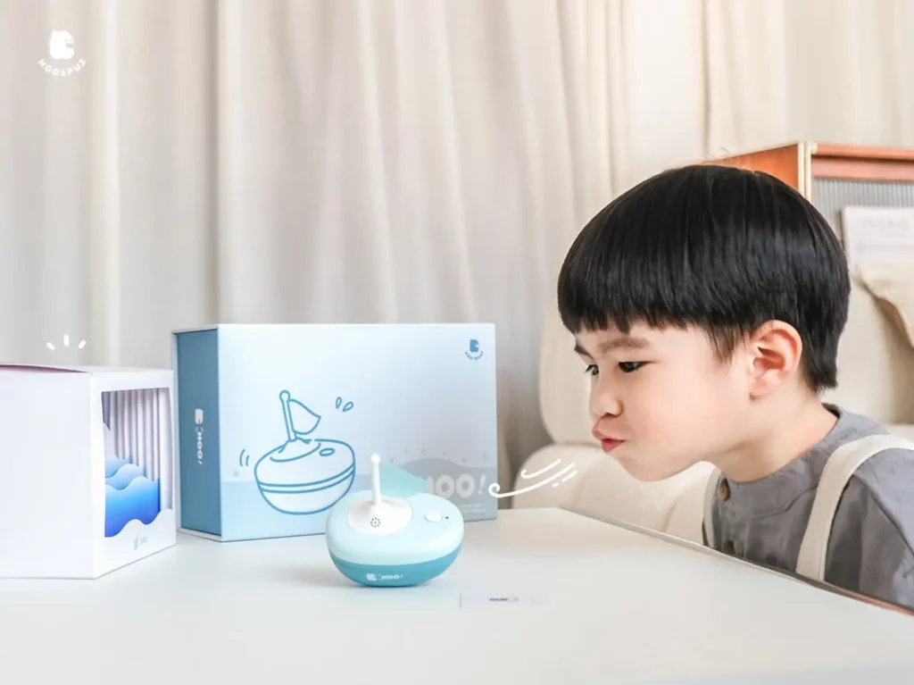 HOO!讓孩子在互動中學習,透過「玩」來完成訓練,讓孩子更願意投入其中並增加復健持續性。(圖/東海大學提供)