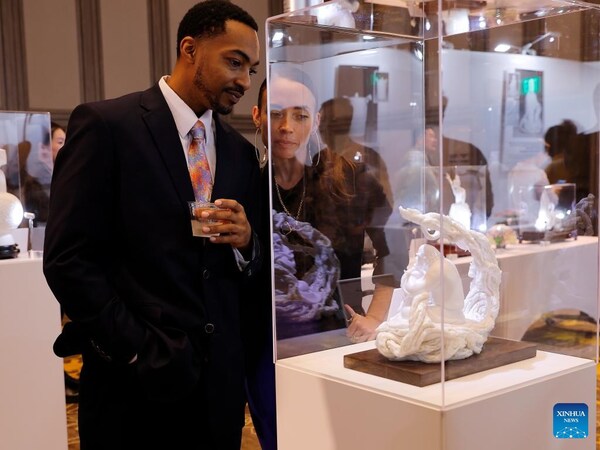 Visitors view an artwork at an exhibition showcasing China's Dehua white porcelain in Los Angeles, the United States, Nov. 21, 2025. The exhibition opened here Friday, drawing over 100 attendees from both countries and aiming to highlight traditional Chinese culture while promoting cross-cultural exchange. Titled "The Aesthetics of Harmony: Blanc de Chine, Porcelain from Dehua," the exhibition featured around 100 finely crafted ceramic artworks and photographic pieces. (Photo by Qiu Chen/Xinhua) Visitors view an artwork at an exhibition showcasing China's Dehua white porcelain in Los Angeles, the United States, Nov. 21, 2025. The exhibition opened here Friday, drawing over 100 attendees from both countries and aiming to highlight traditional Chinese culture while promoting cross-cultural exchange. Titled "The Aesthetics of Harmony: Blanc de Chine, Porcelain from Dehua," the exhibition featured around 100 finely crafted ceramic artworks and photographic pieces. (Photo by Qiu Chen/Xinhua)