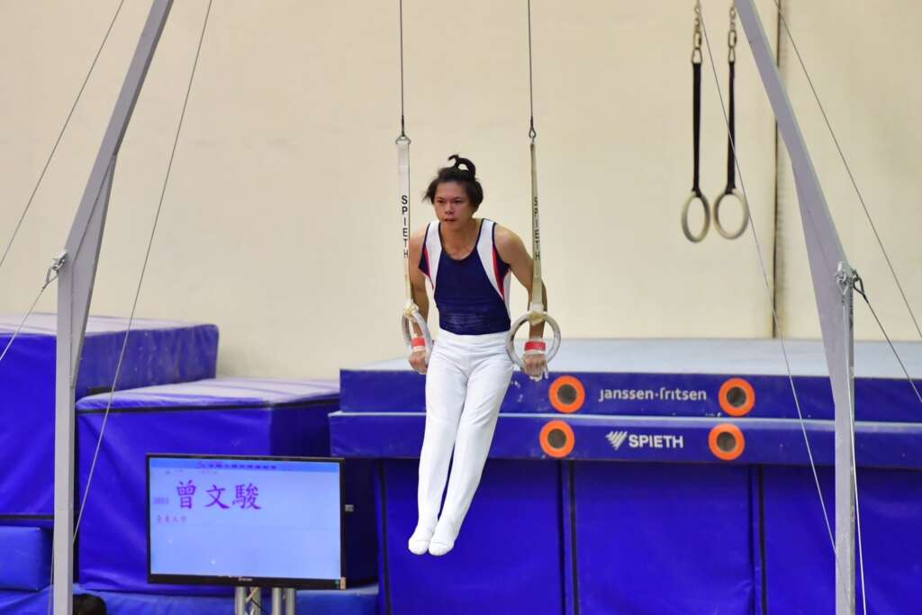 ∆曾文駿參加吊環比賽英姿。（圖 文化大學新聞系競技體操轉播團隊／提供）