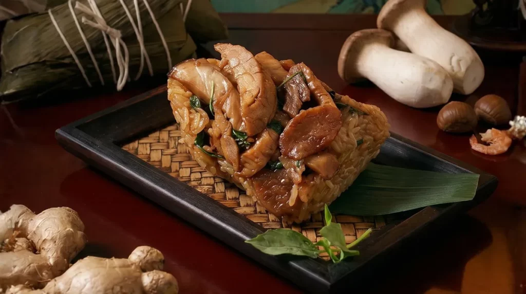 人氣素粽「三杯杏鮑菇粽」以三杯醬汁拌炒杏鮑菇，鹹香入味。圖／台北老爺酒店提供