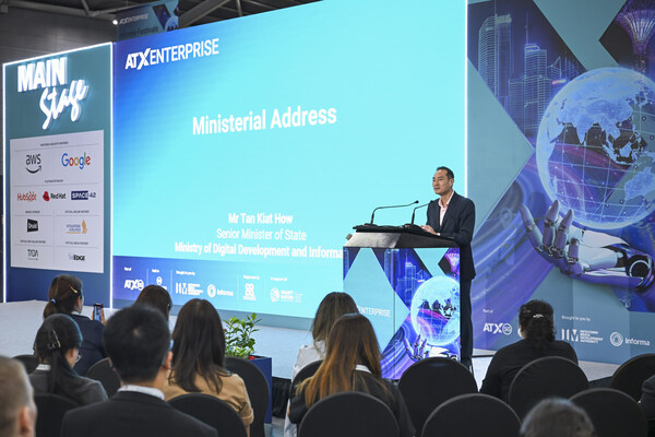 Senior Minister of State, Ministry of Digital Development and Information Mr. Tan Kiat How delivering an address at ATxEnterprise 2026 Senior Minister of State, Ministry of Digital Development and Information Mr. Tan Kiat How delivering an address at ATxEnterprise 2026
