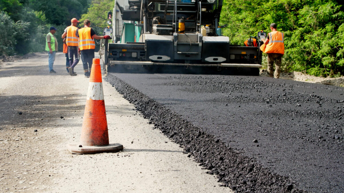 repair highway road construction works workers lay asphalt there are lots special equipment scaled
